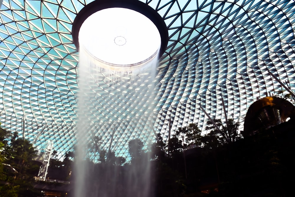 the inside of a building with a fountain