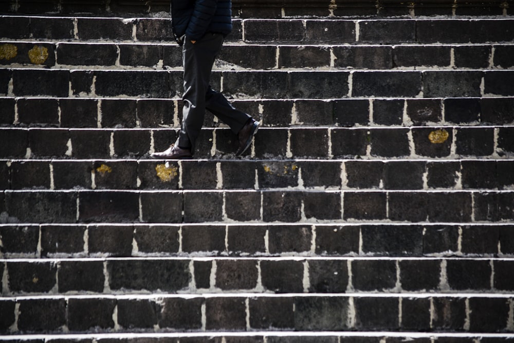 a person walking up a set of stairs