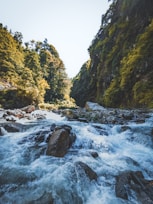 a river that has some rocks in it