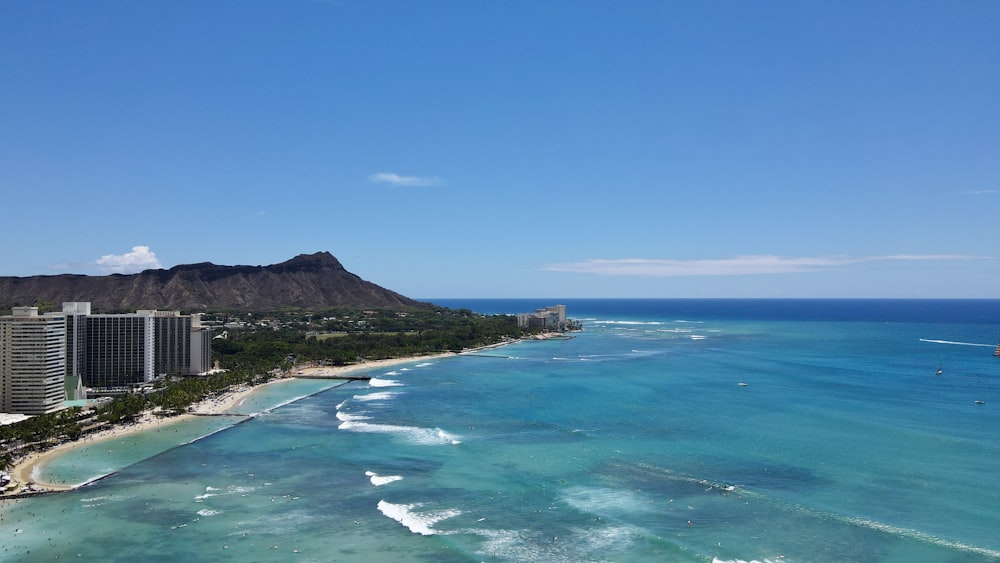 a view of the ocean and a beach from a high point of view