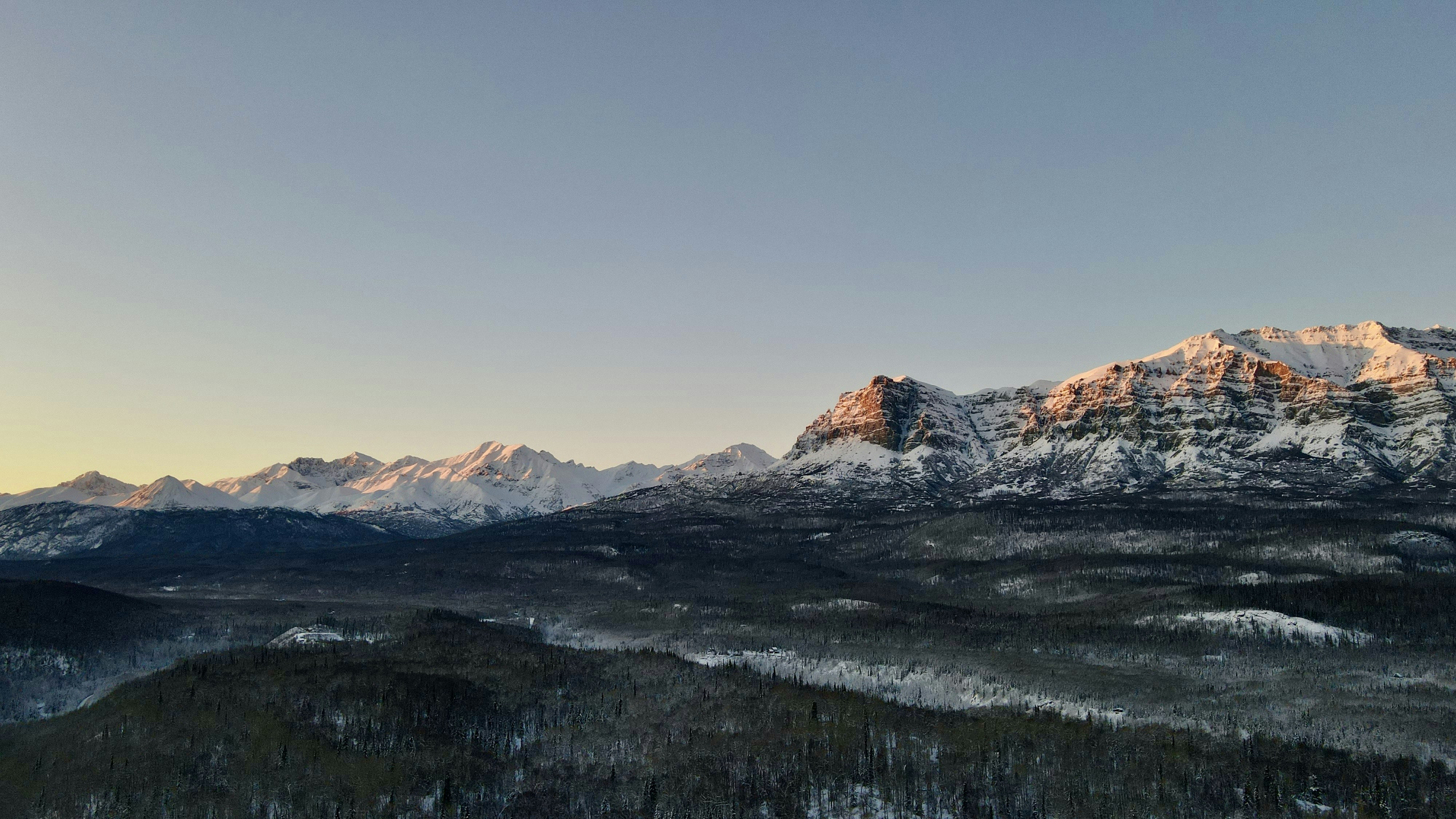 Mountain Range with Snow Covered Mountains in the
