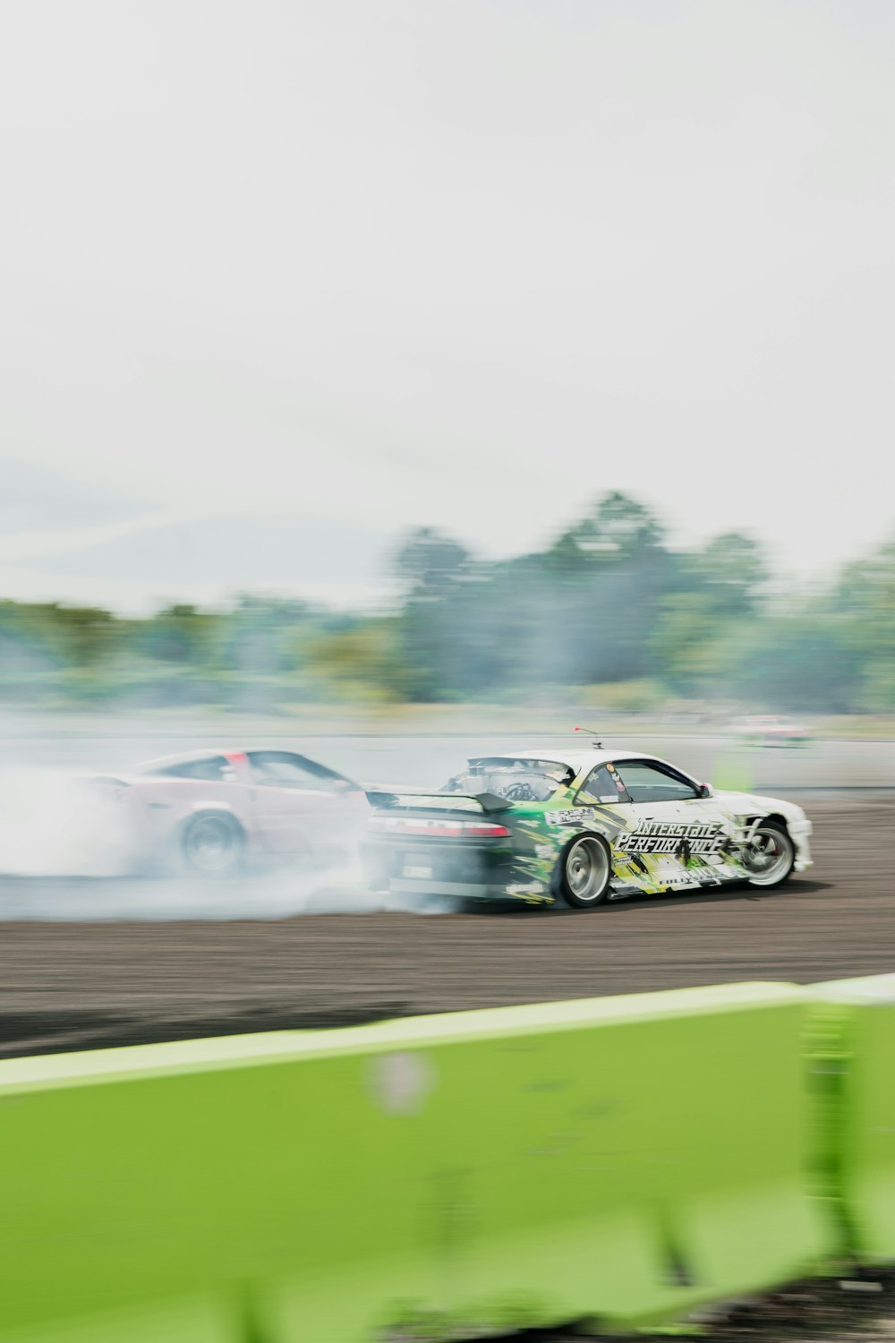 a couple of cars that are on a track