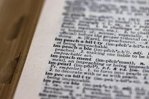 a close up of an open book with words on it