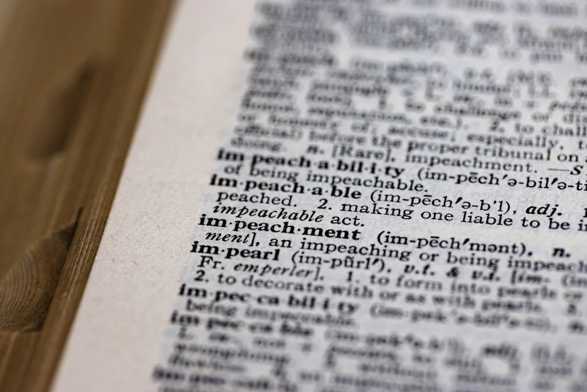 a close up of an open book with words on it