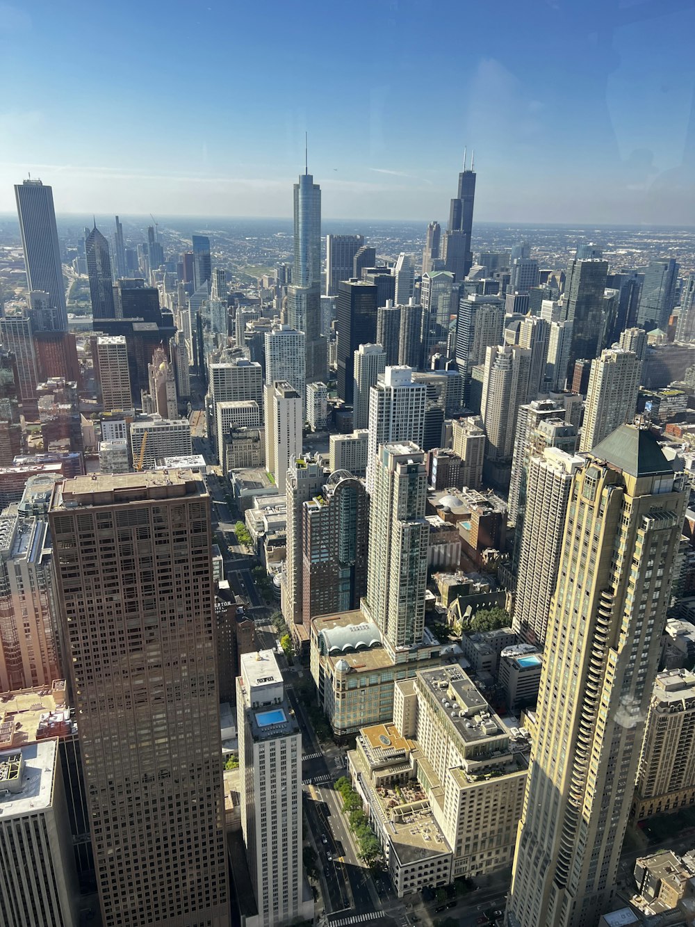 a view of a city from the top of a skyscraper