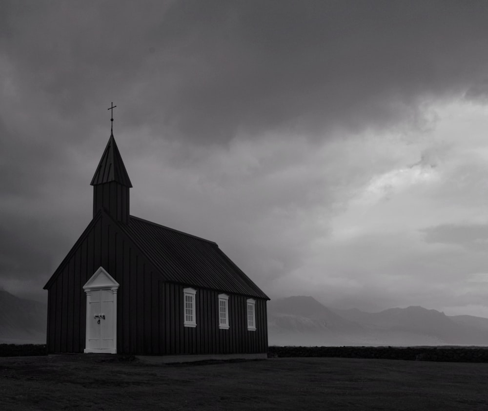 a black and white photo of a church