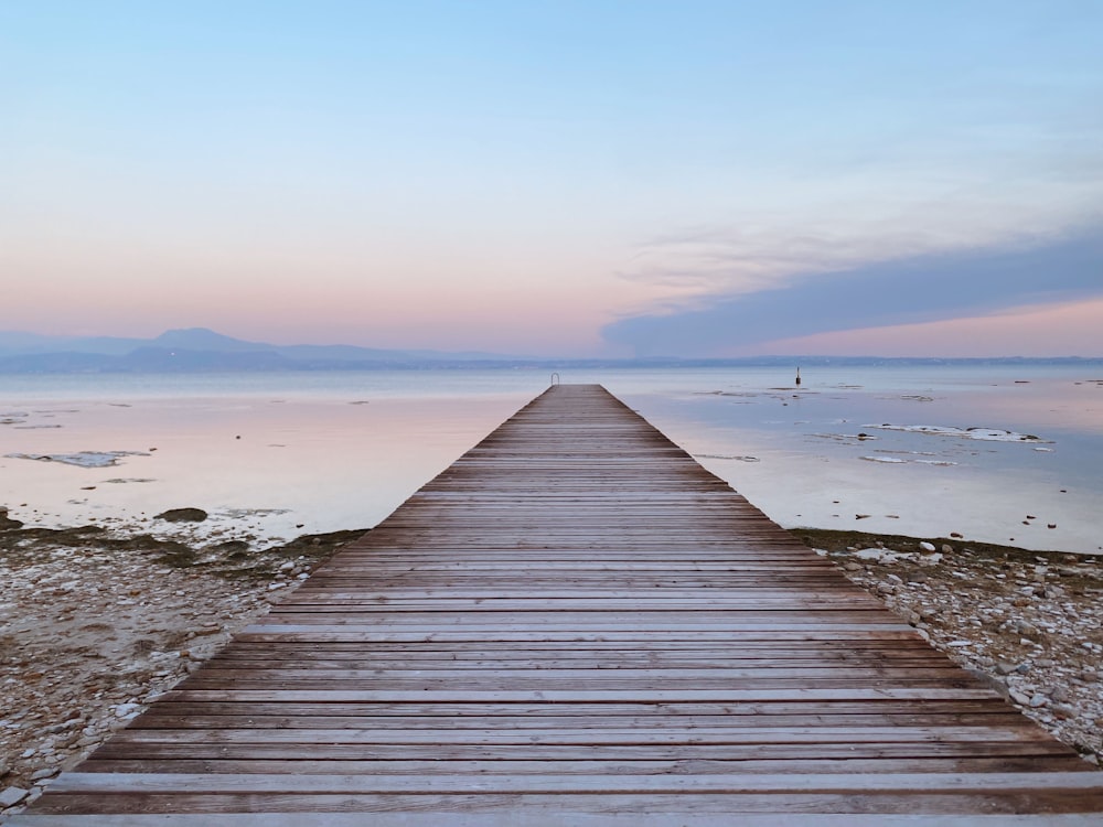 a long wooden dock extending into the water