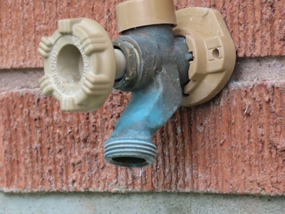 Close-up of a sturdy PVC water tap with a smooth finish, highlighting its leak-proof design.