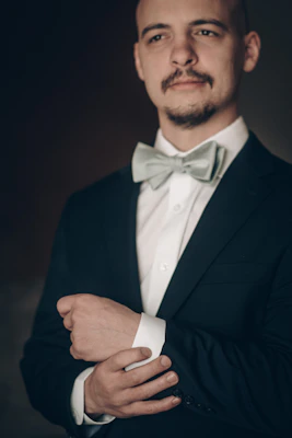 Man in formal suit with bow tie