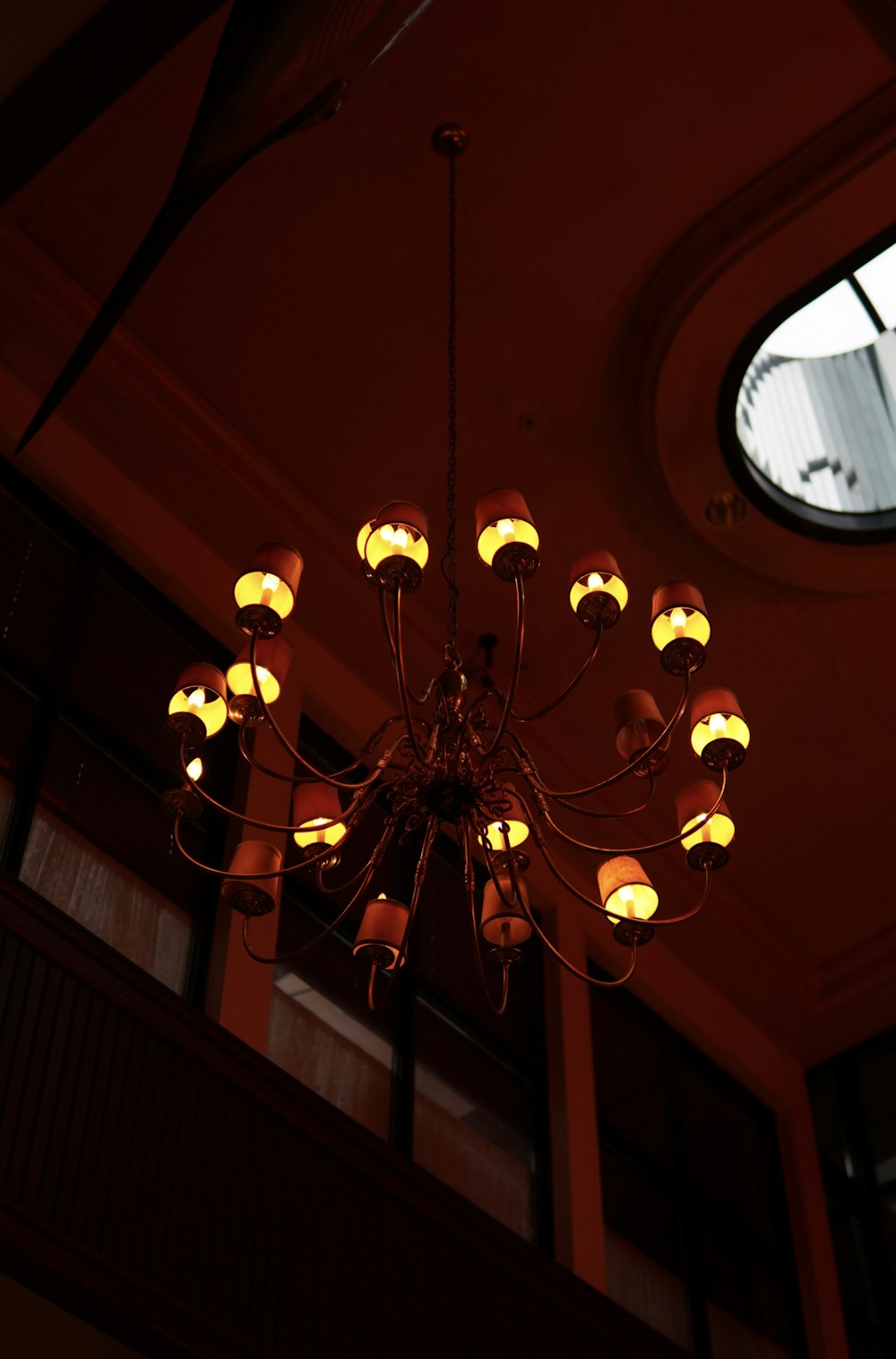 a chandelier hanging from a ceiling in a room