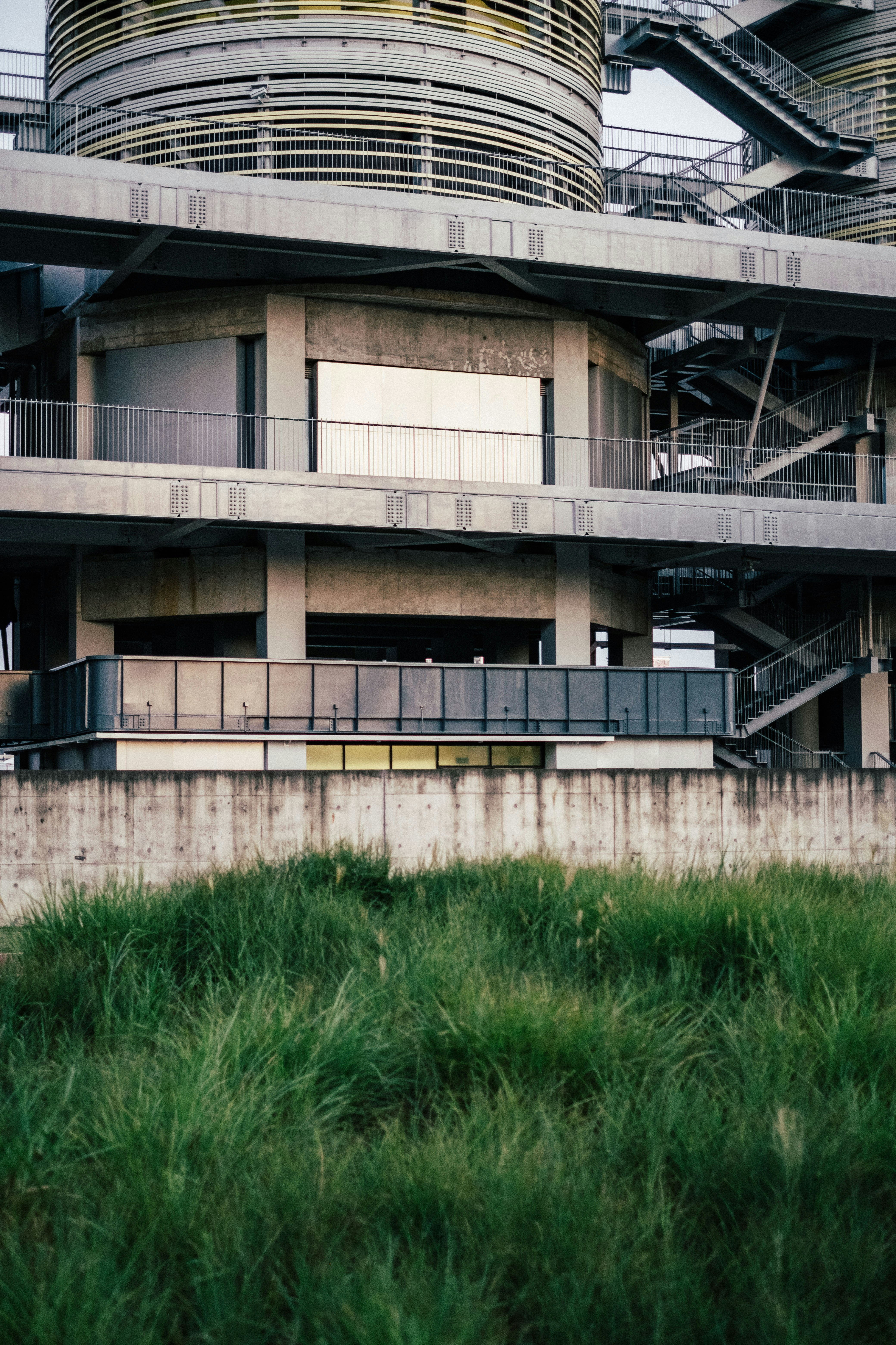 a building with a spiral staircase in front of it