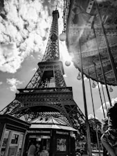 A vibrant photo of the Eiffel Tower glowing at dusk, symbolizing the gateway to unforgettable journeys.
