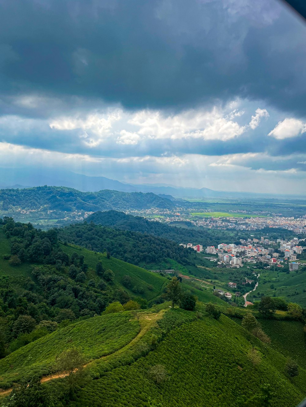 a view of a city from a hill