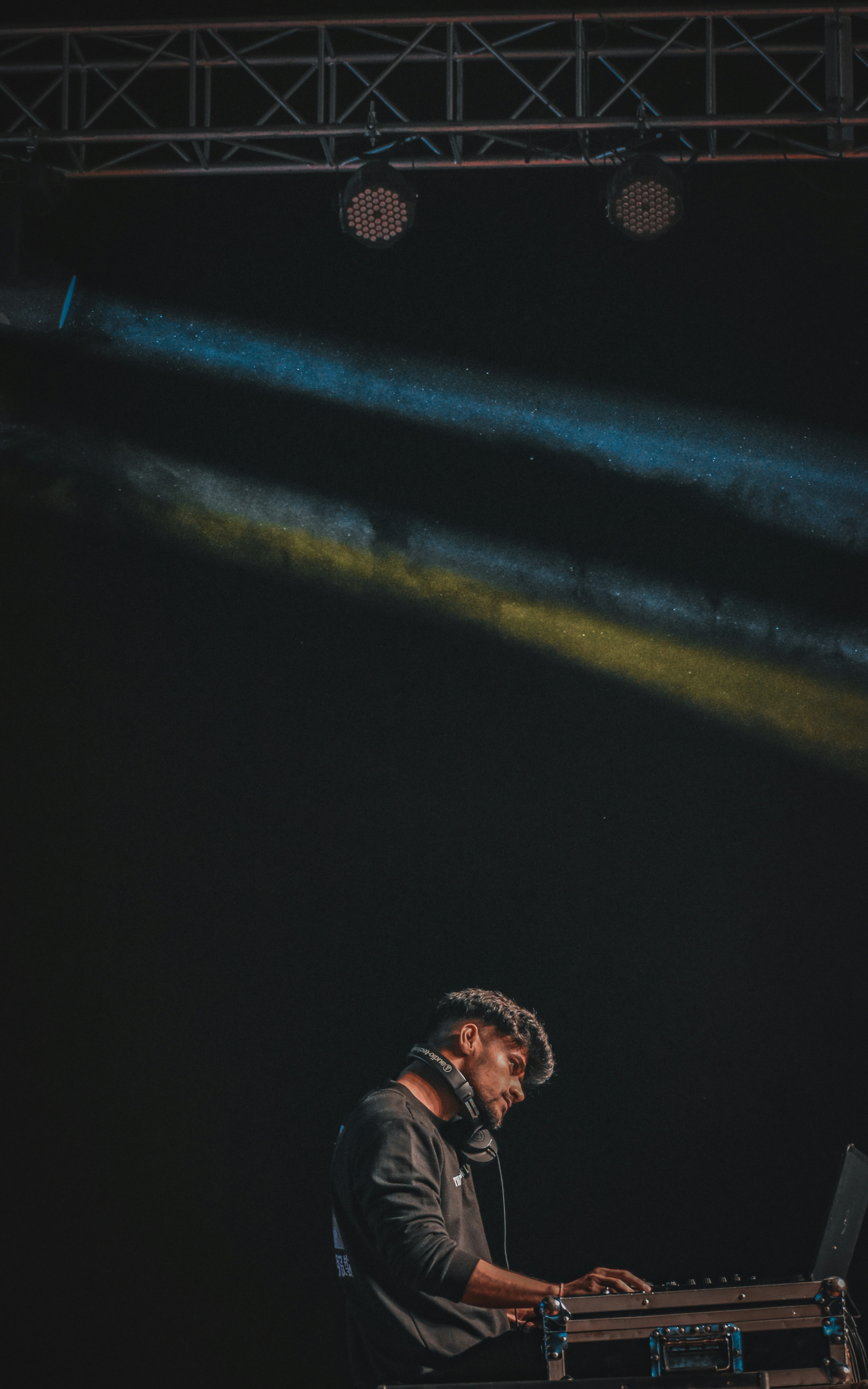 woman wearing yellow long-sleeved dress under white clouds and blue sky during daytime