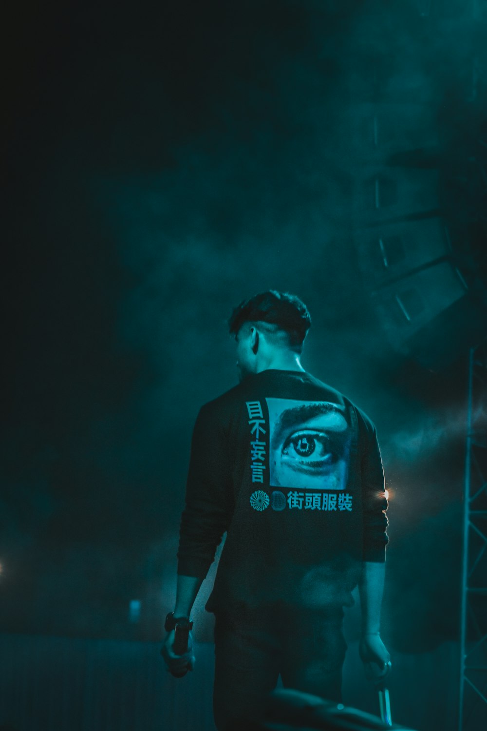 a man standing in front of a stage