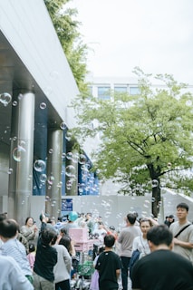 Bubble machine creating a magical atmosphere at an outdoor celebration