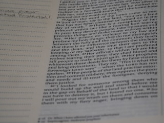 Close-up of open Bible with highlighted Pentecostal notes.