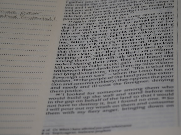 A close-up of a book with notes, symbolizing research in omnitology.