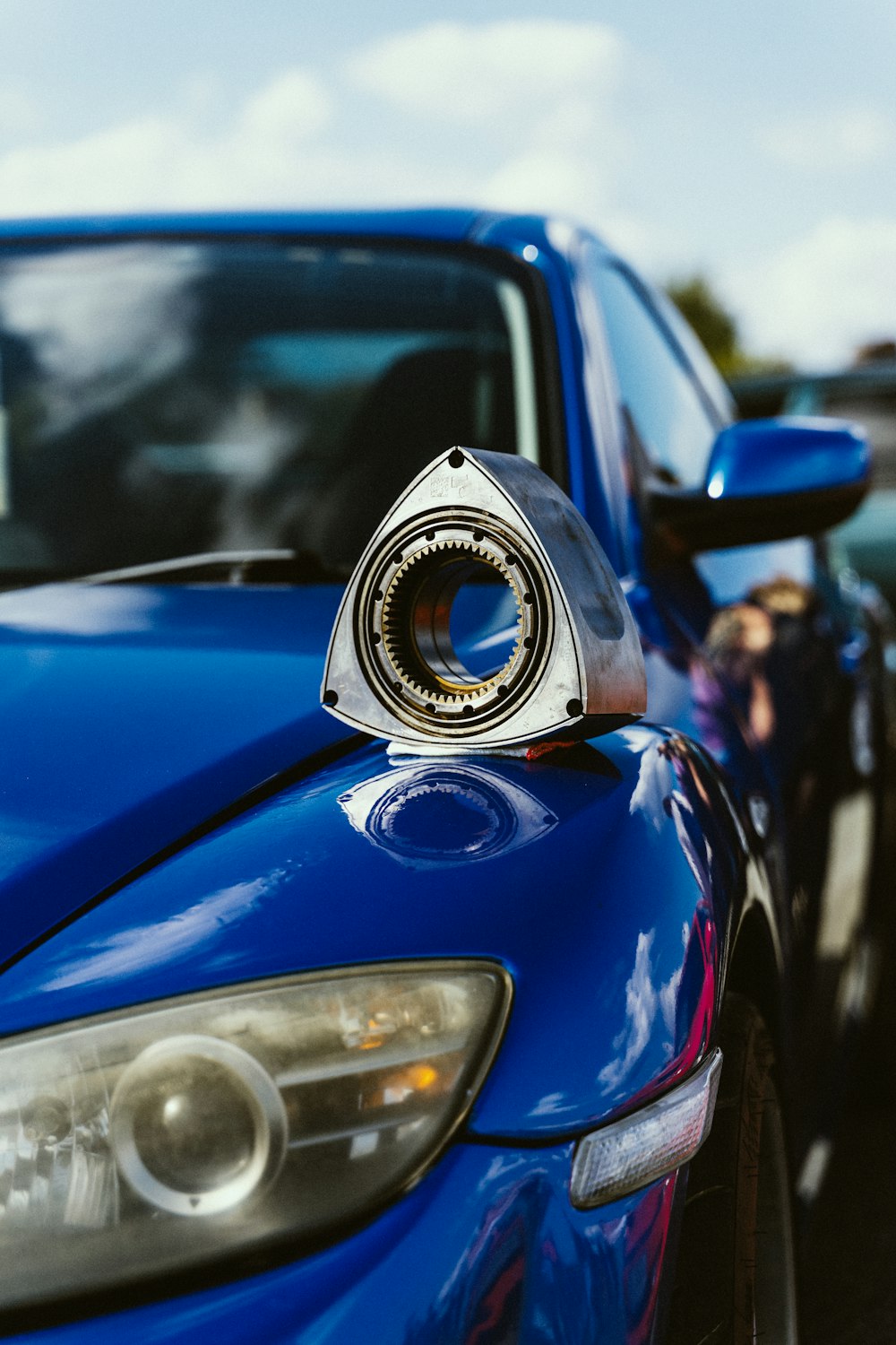 a close up of a car with a mirror on it