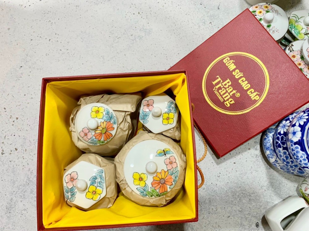 a box of tea balls sitting on top of a table