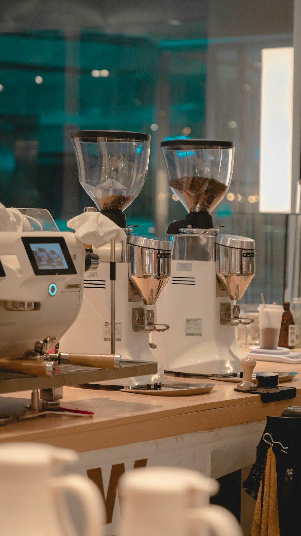 a coffee machine sitting on top of a wooden table