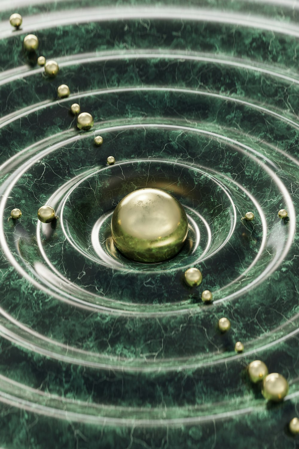 a green and gold object floating in a pool of water