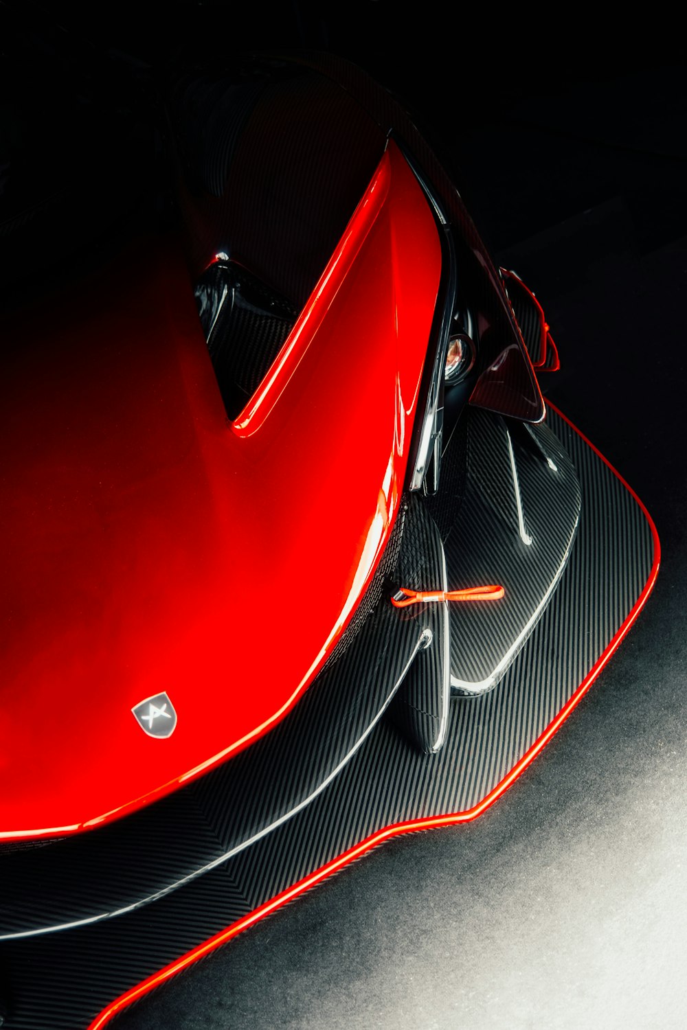 a close up of a red and black sports car