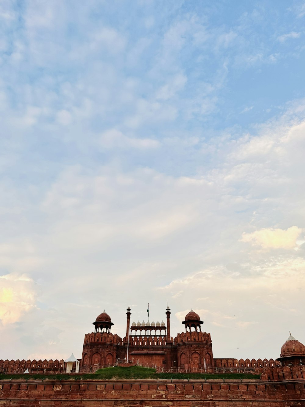 a large brick building with a clock tower on top of it