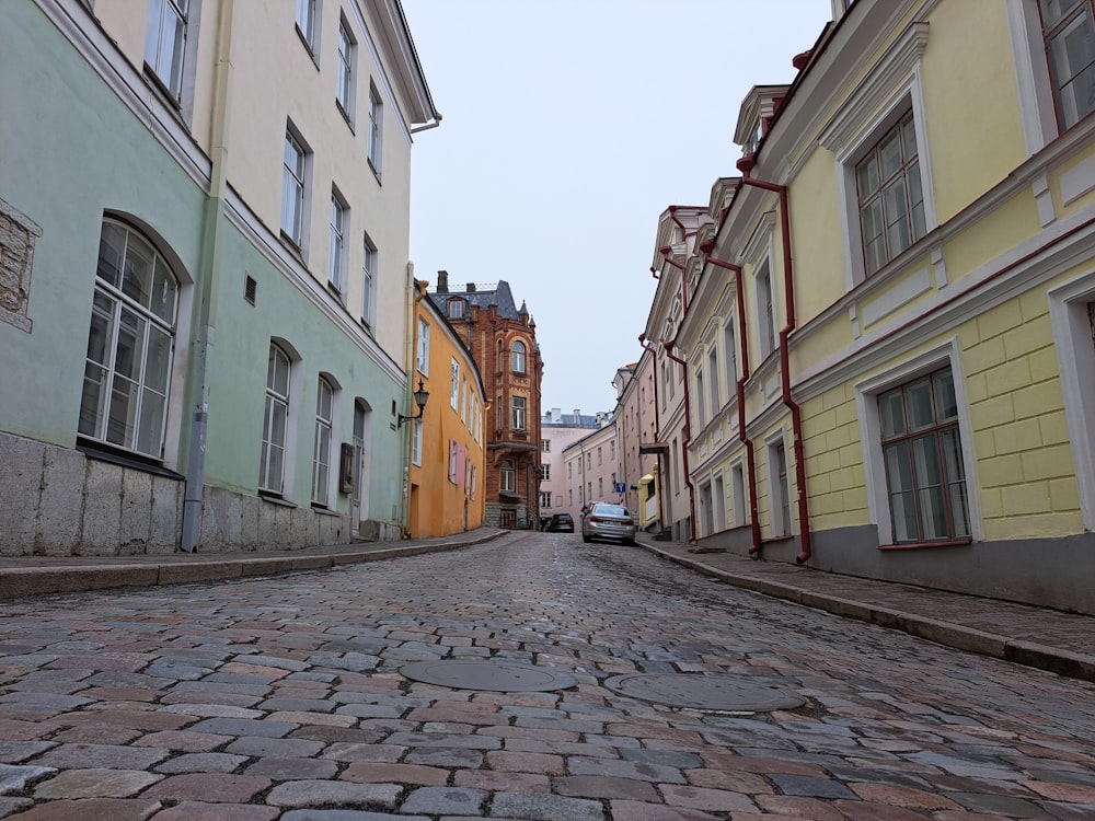 a cobblestone street in a european city