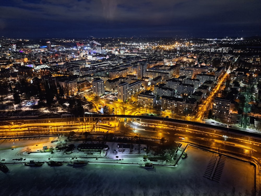 an aerial view of a city at night