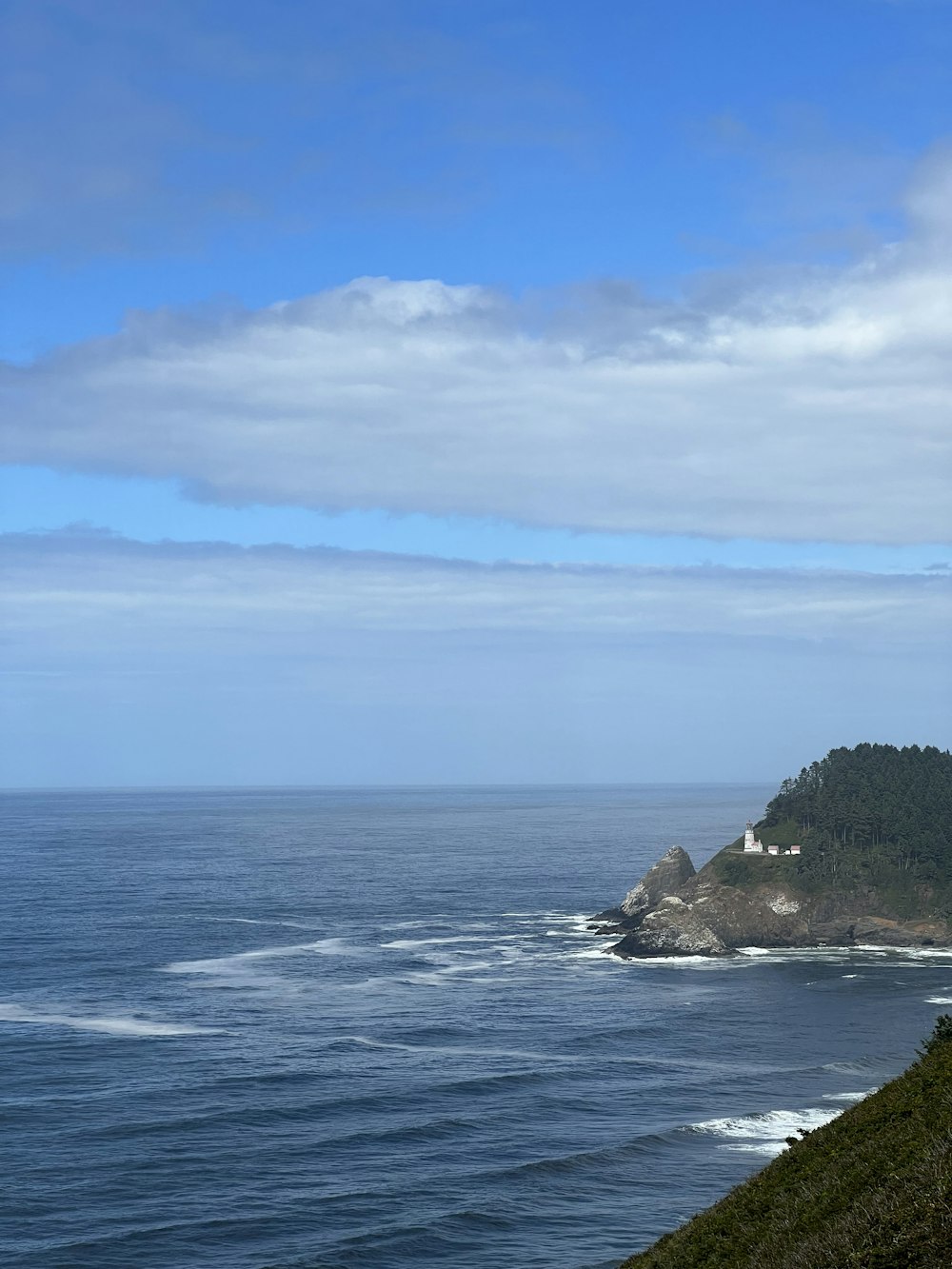 a view of the ocean from a hill