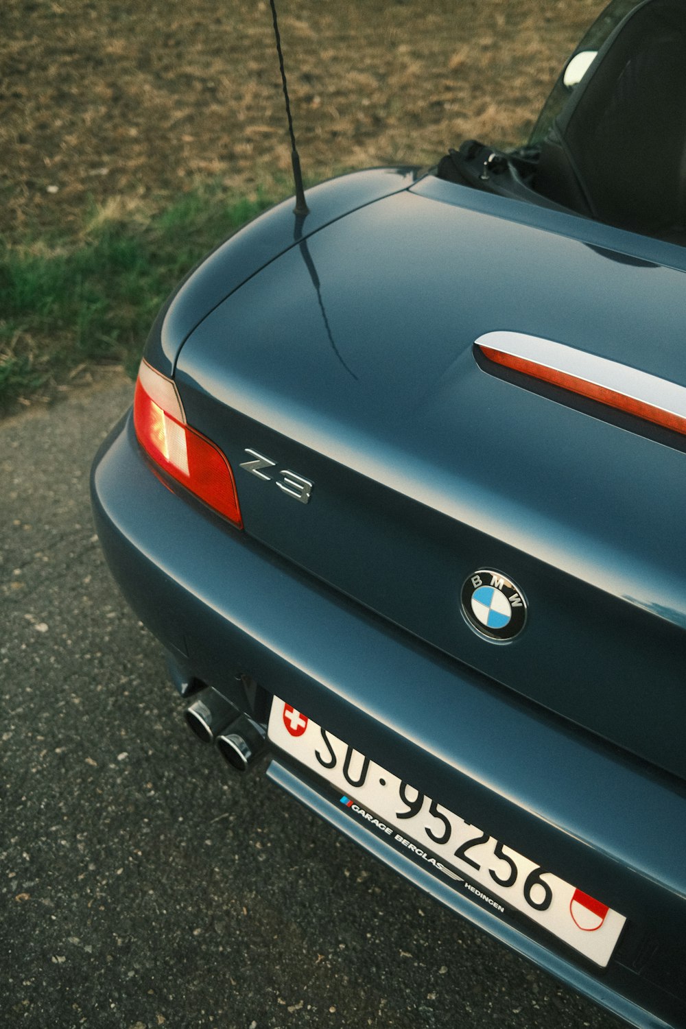 a close up of a car parked in a parking lot