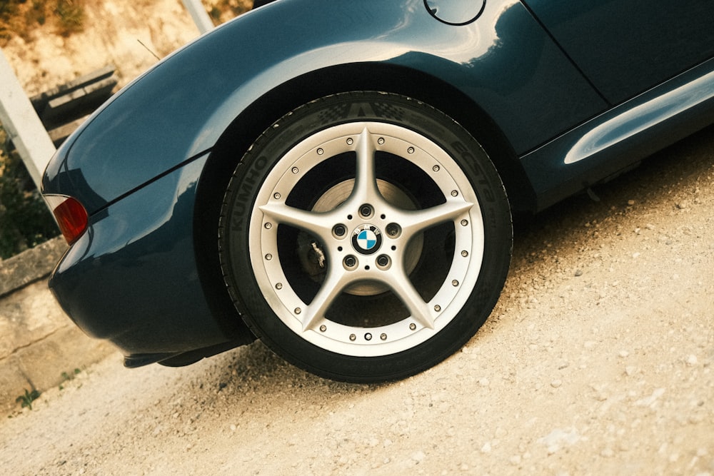 a close up of a car tire on a road