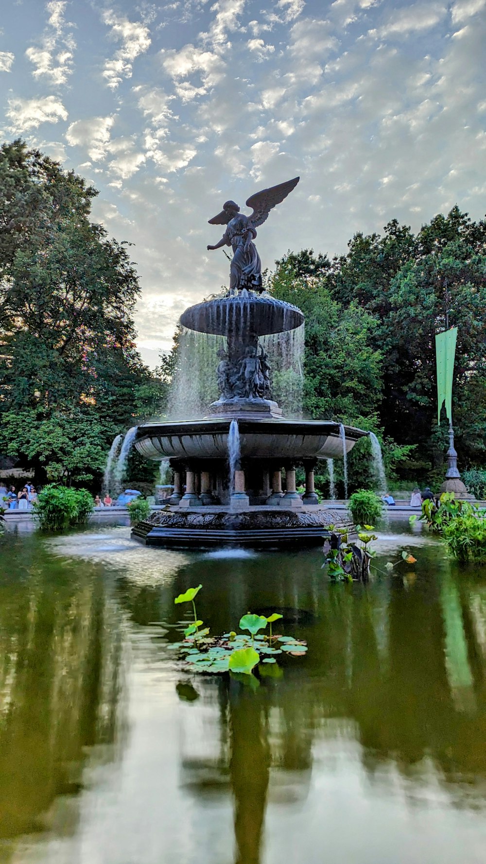 a fountain with a statue on top of it