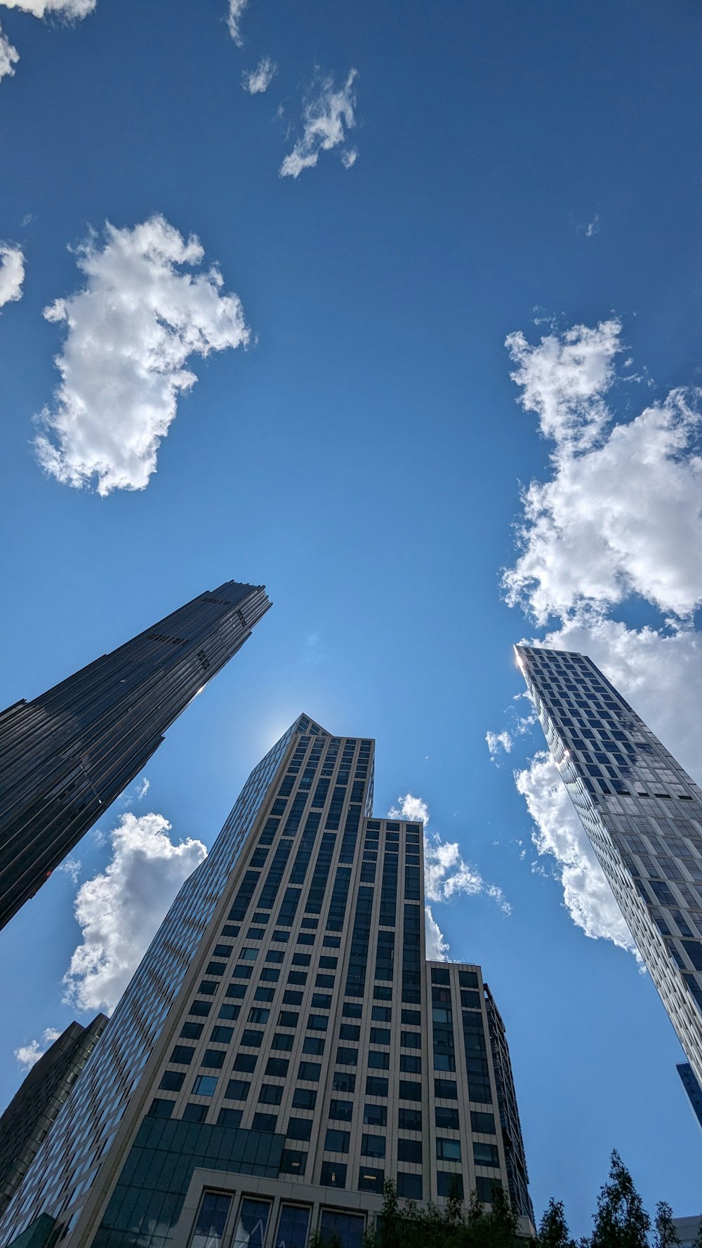 a group of tall buildings standing next to each other