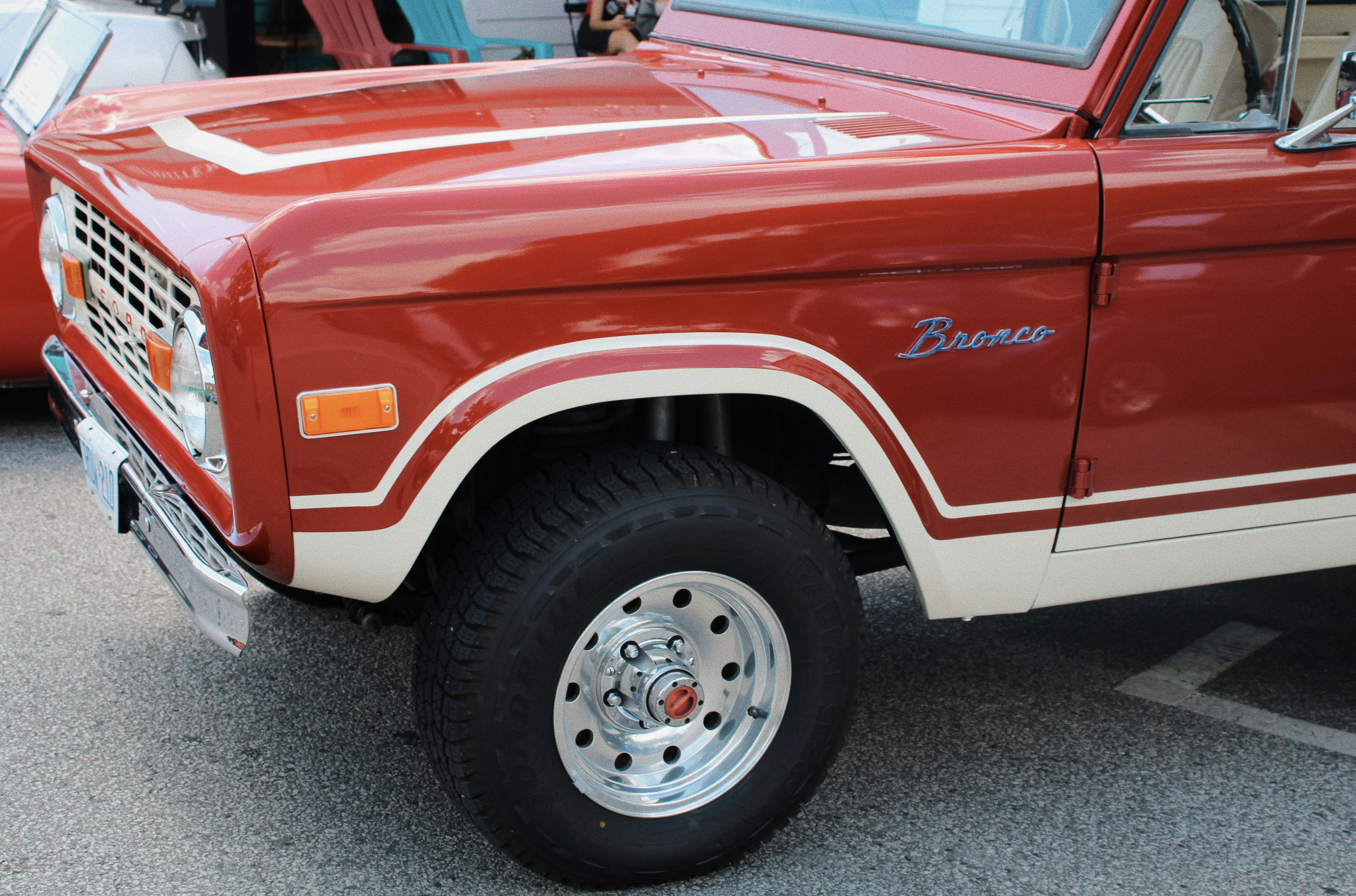 a red truck parked in a parking lot