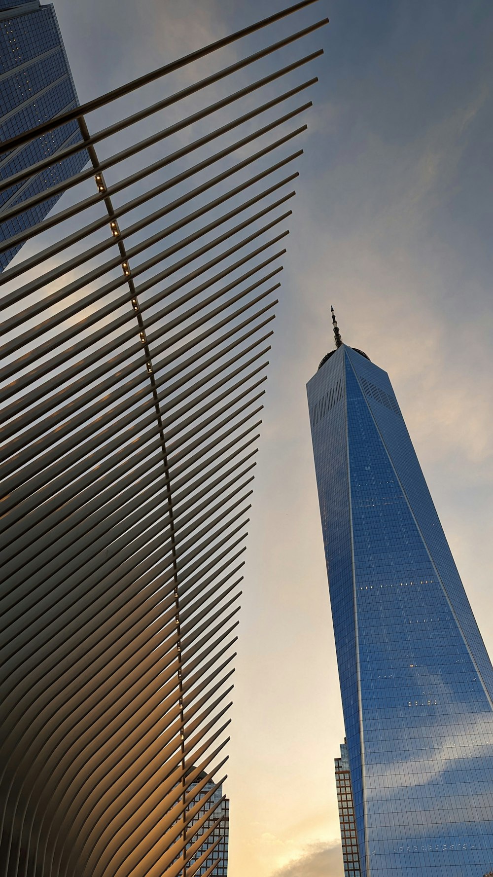 a very tall building next to a very tall building