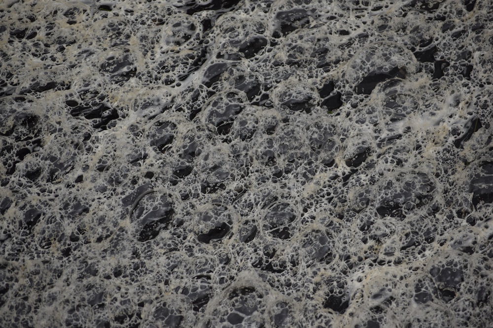 a close up of a black and white marble surface