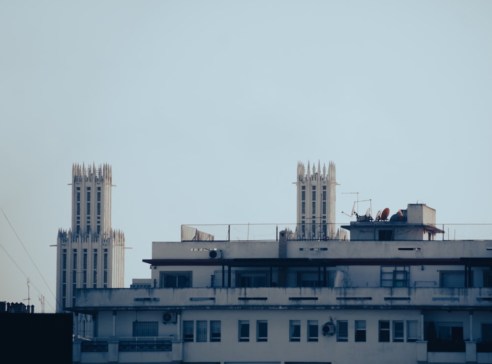 a tall building with a clock on the top of it