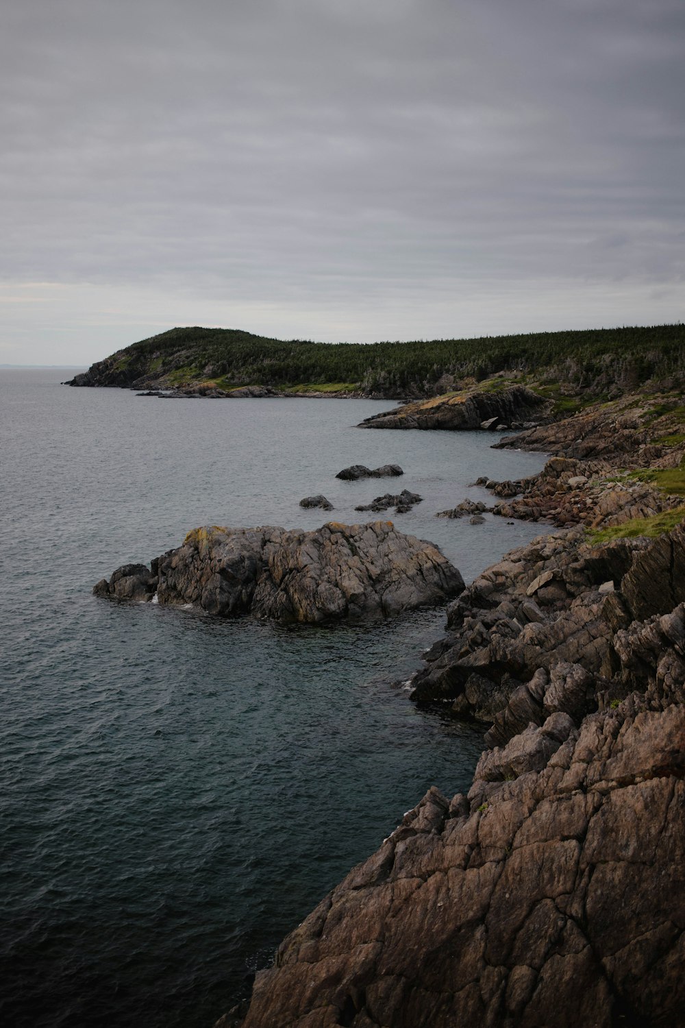 a large body of water surrounded by rocks