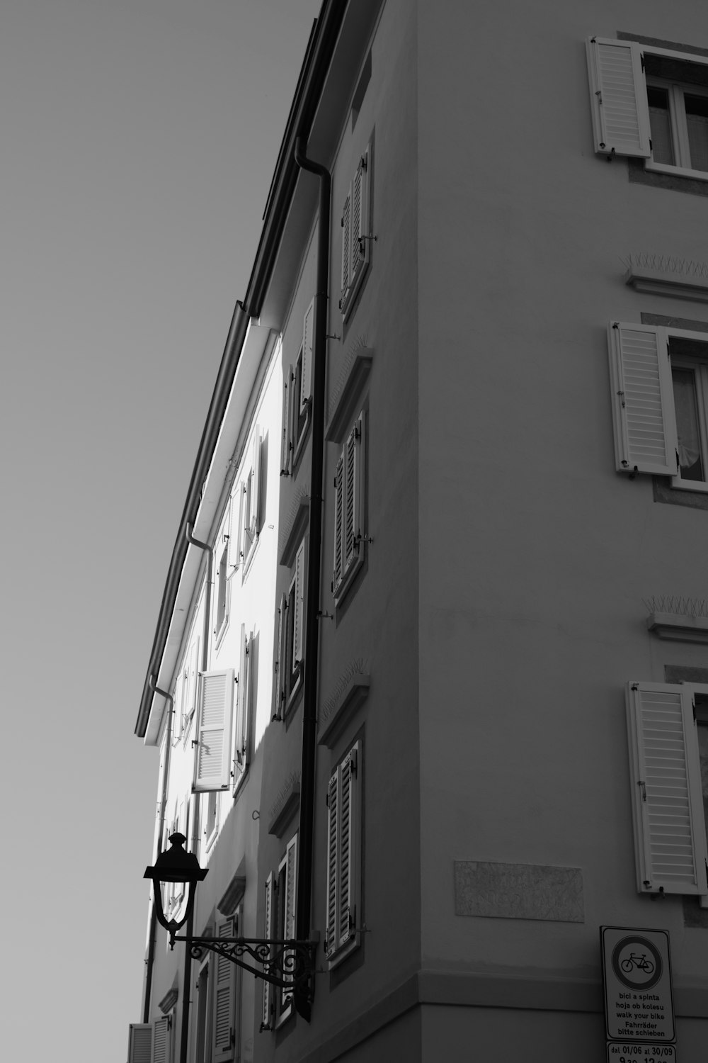 a black and white photo of a tall building