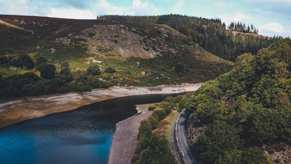 an aerial view of a mountain with a river running through it