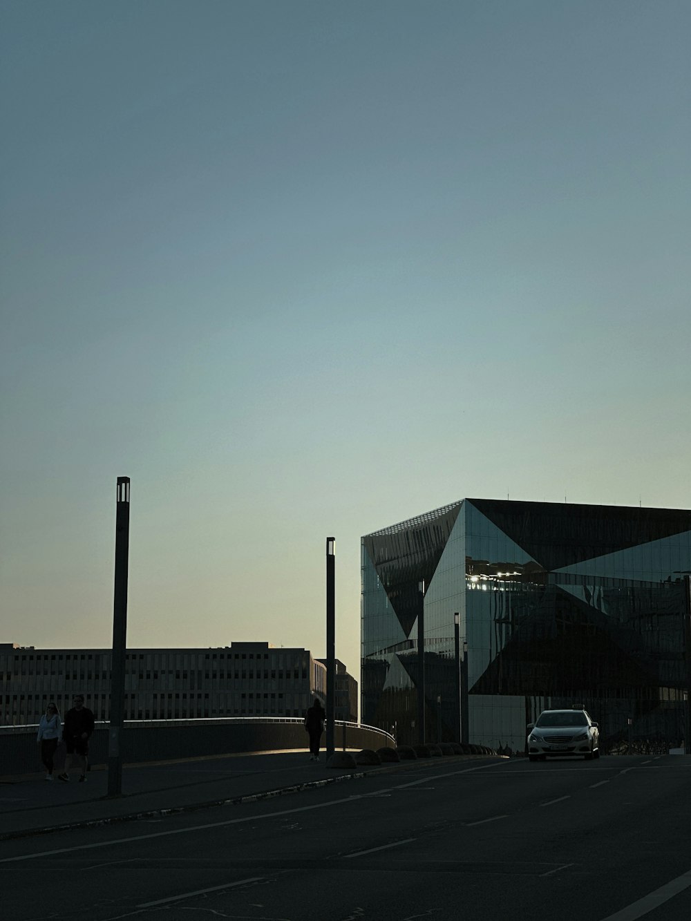 a car is parked in front of a building