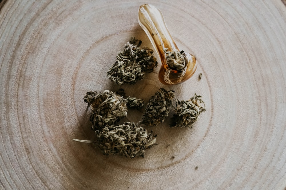 a plate with a bunch of dried flowers on it