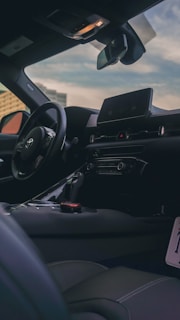 Interior dashboard and steering wheel of a modern car