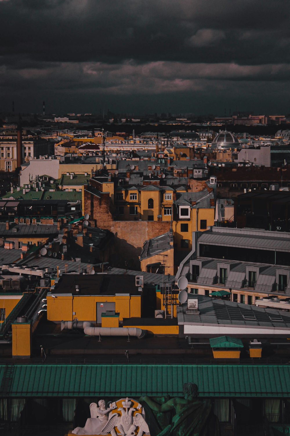 a view of a city at night with a cloudy sky