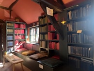 An inviting library space with light purple accents and bright decor.