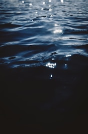 the sun is shining over the ocean water