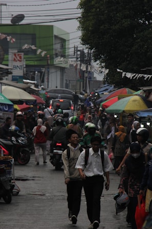 A vibrant city street scene with a person wearing a stylish phượt jacket