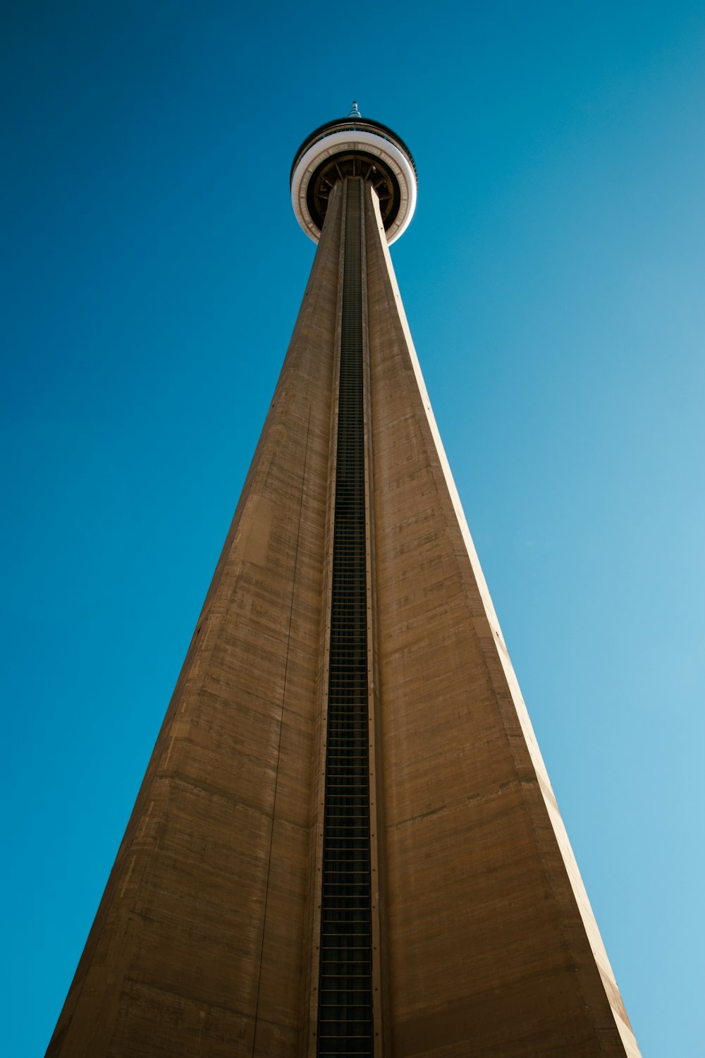 a tall tower with a sky background